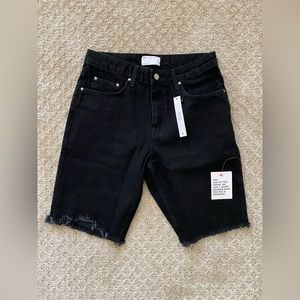 ASOS Designs slim denim shorts in black with raw hem